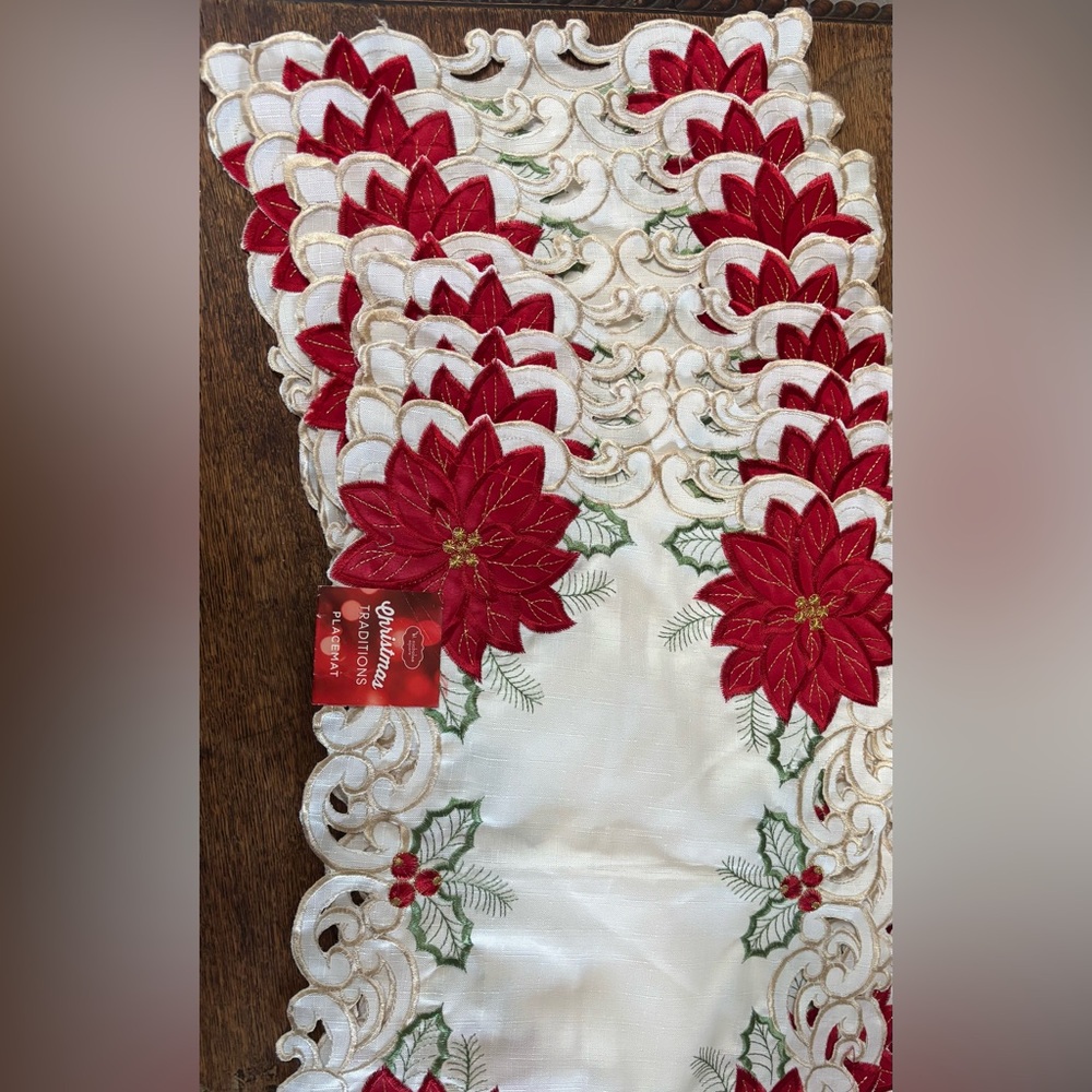 Poinsettia cut out placemats (8) and 1 table runner.